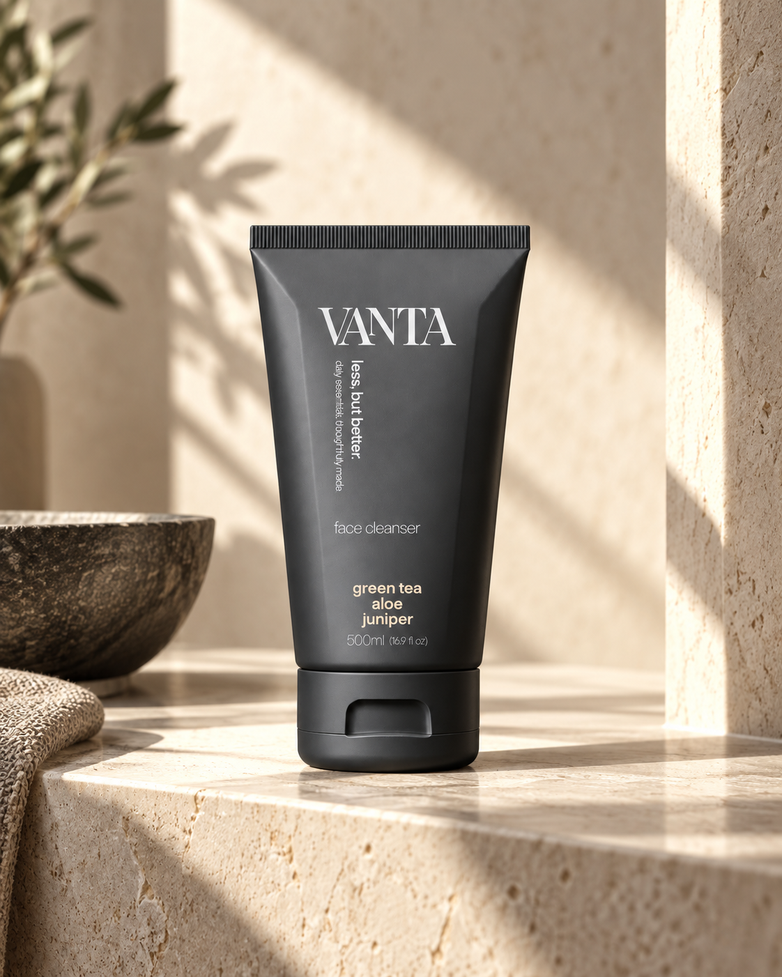 VANTA face cleanser product photography in a warm stone environment